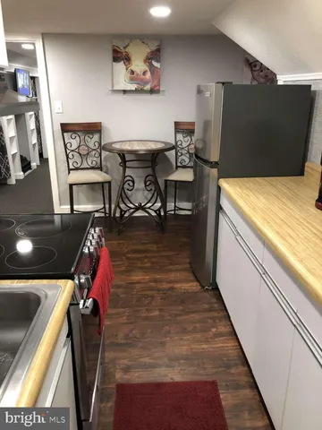 a bed room with a bed and furniture