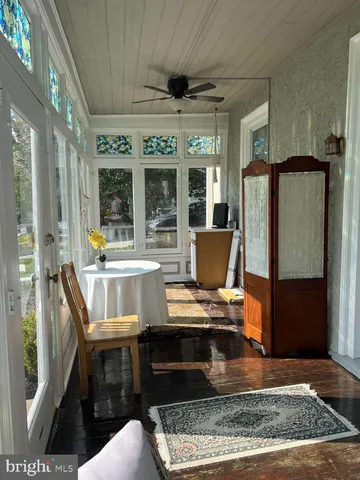 a workspace with furniture and window