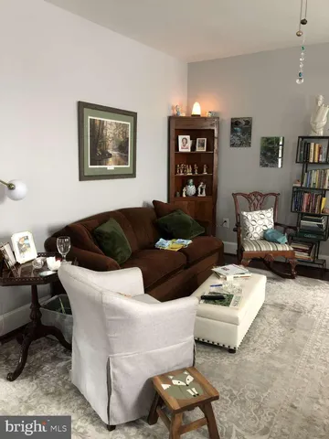 a living room with furniture and a couch