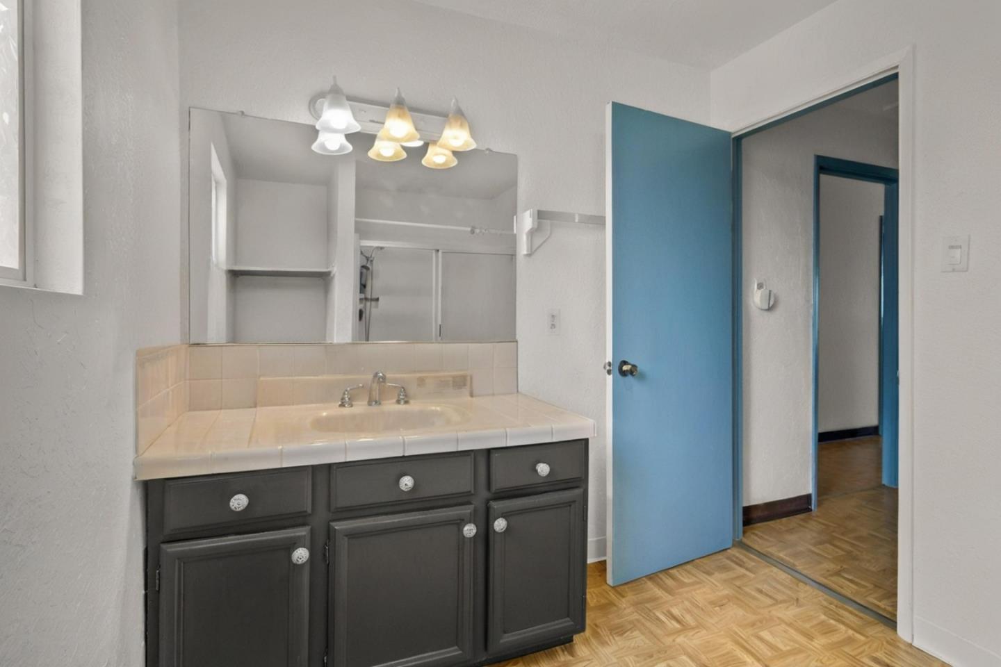 25540 Payson Street Chualar, CA 93925 - Photo 15 of 31 a bathroom with a sink and a mirror