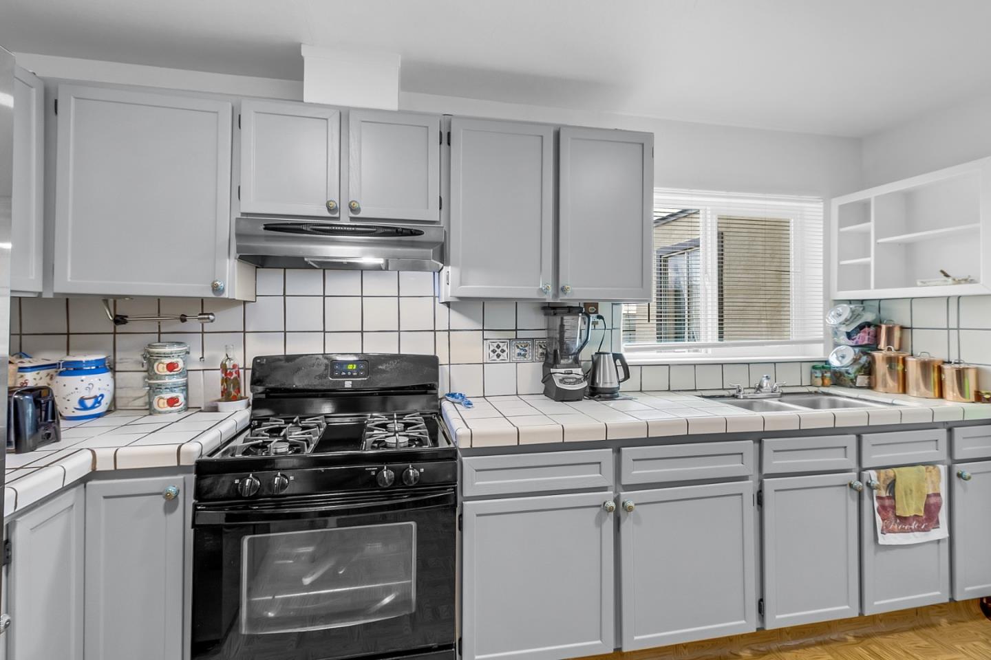 25540 Payson Street Chualar, CA 93925 - Photo 17 of 31 a kitchen with appliances a sink and cabinets