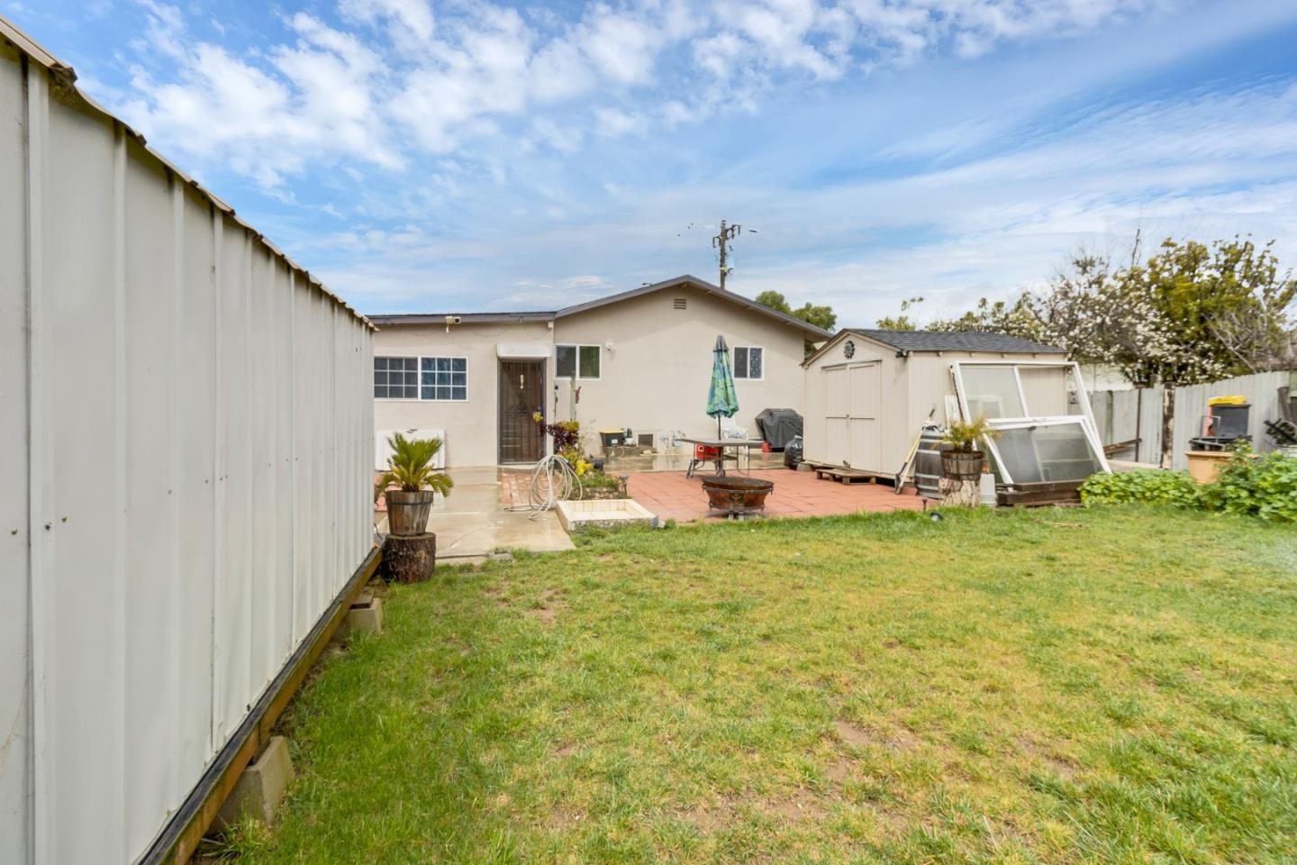 25540 Payson Street Chualar, CA 93925 - Photo 24 of 31 a view of a backyard with plants and patio