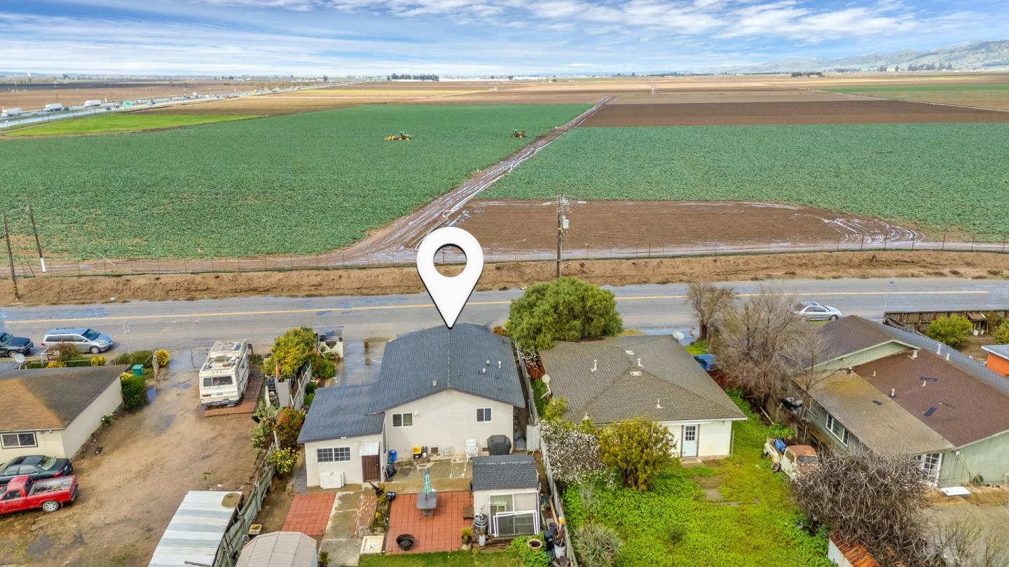 25540 Payson Street Chualar, CA 93925 - Photo 30 of 31 an aerial view of a house with a swimming pool