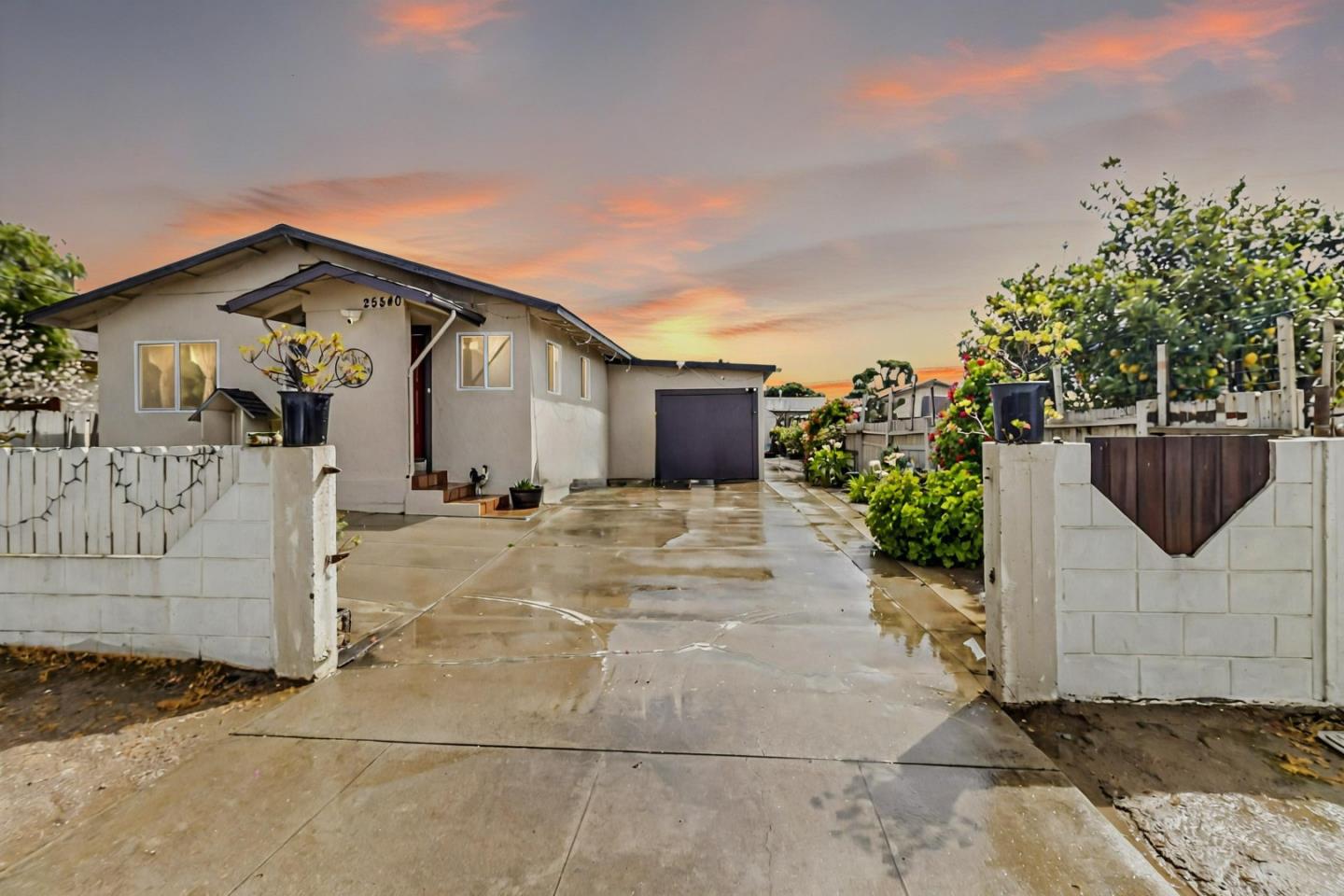 25540 Payson Street Chualar, CA 93925 - Photo 3 of 31 a front view of a house with a garden