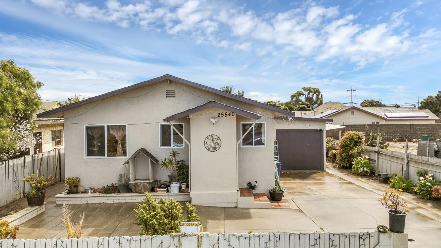 25540 Payson Street Chualar, CA 93925 - Photo 4 of 31 a front view of a house with garden