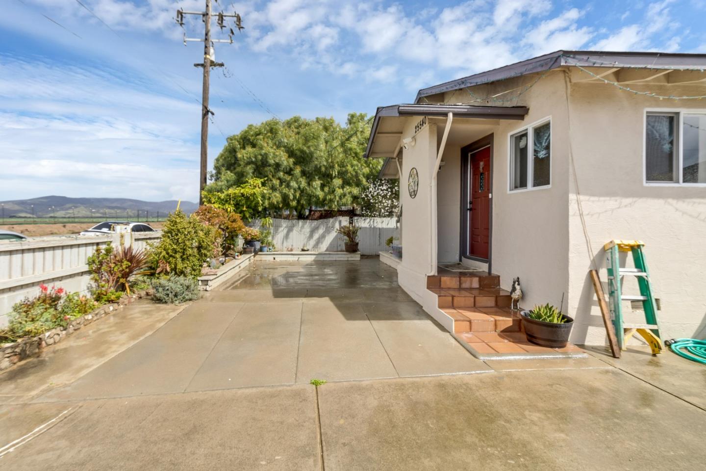 25540 Payson Street Chualar, CA 93925 - Photo 5 of 31 a front view of a house with a yard