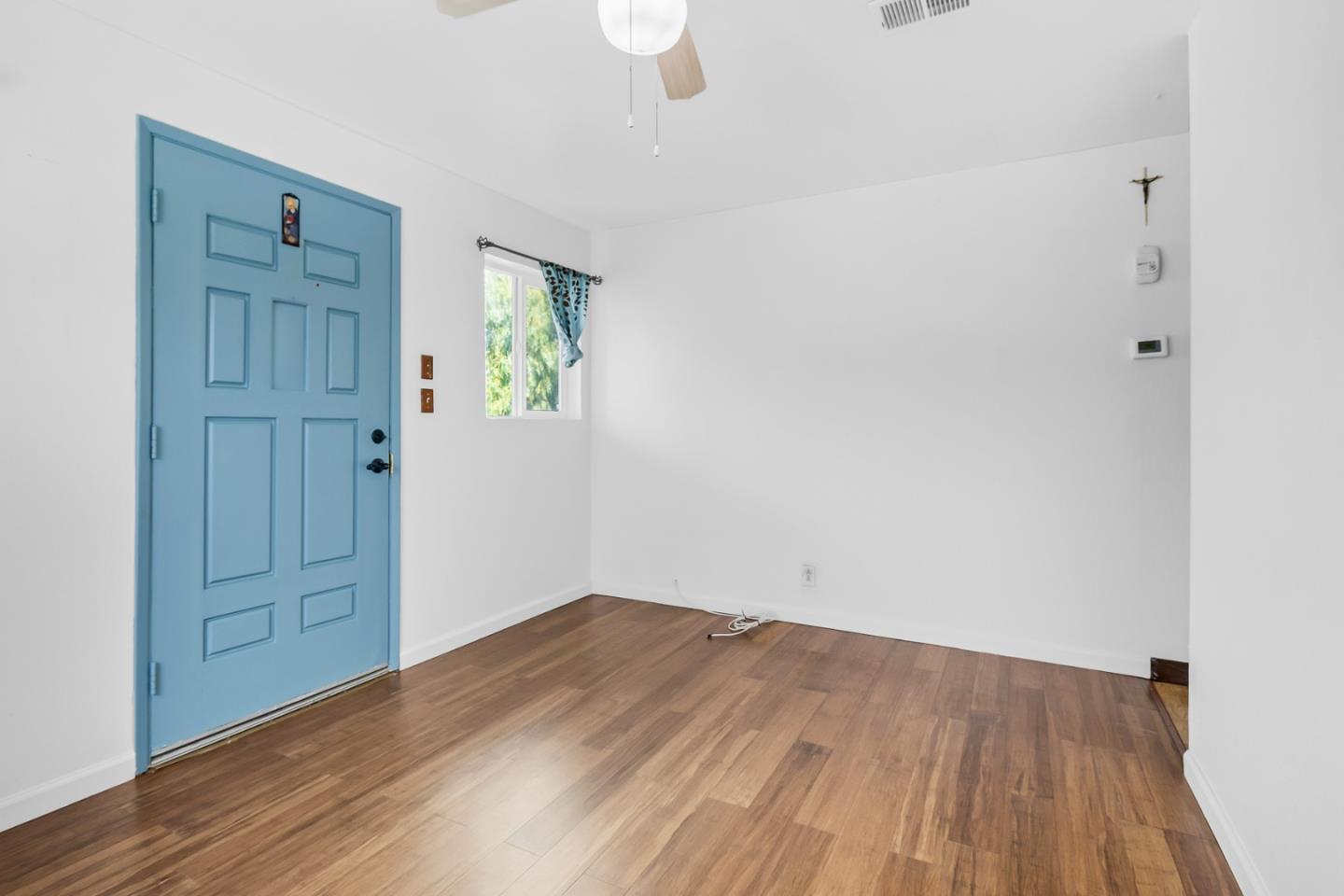 25540 Payson Street Chualar, CA 93925 - Photo 9 of 31 wooden floor in an empty room