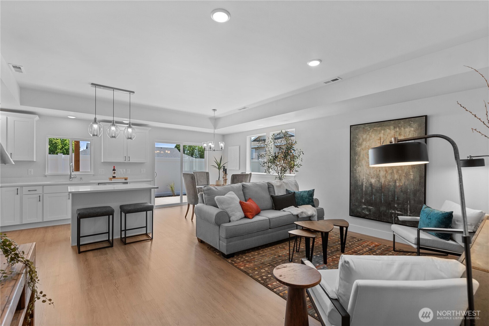 1030 Finch Lane, Unit H1 Wenatchee, WA 98801 - Photo 5 of 30 a living room with furniture and a wooden floor