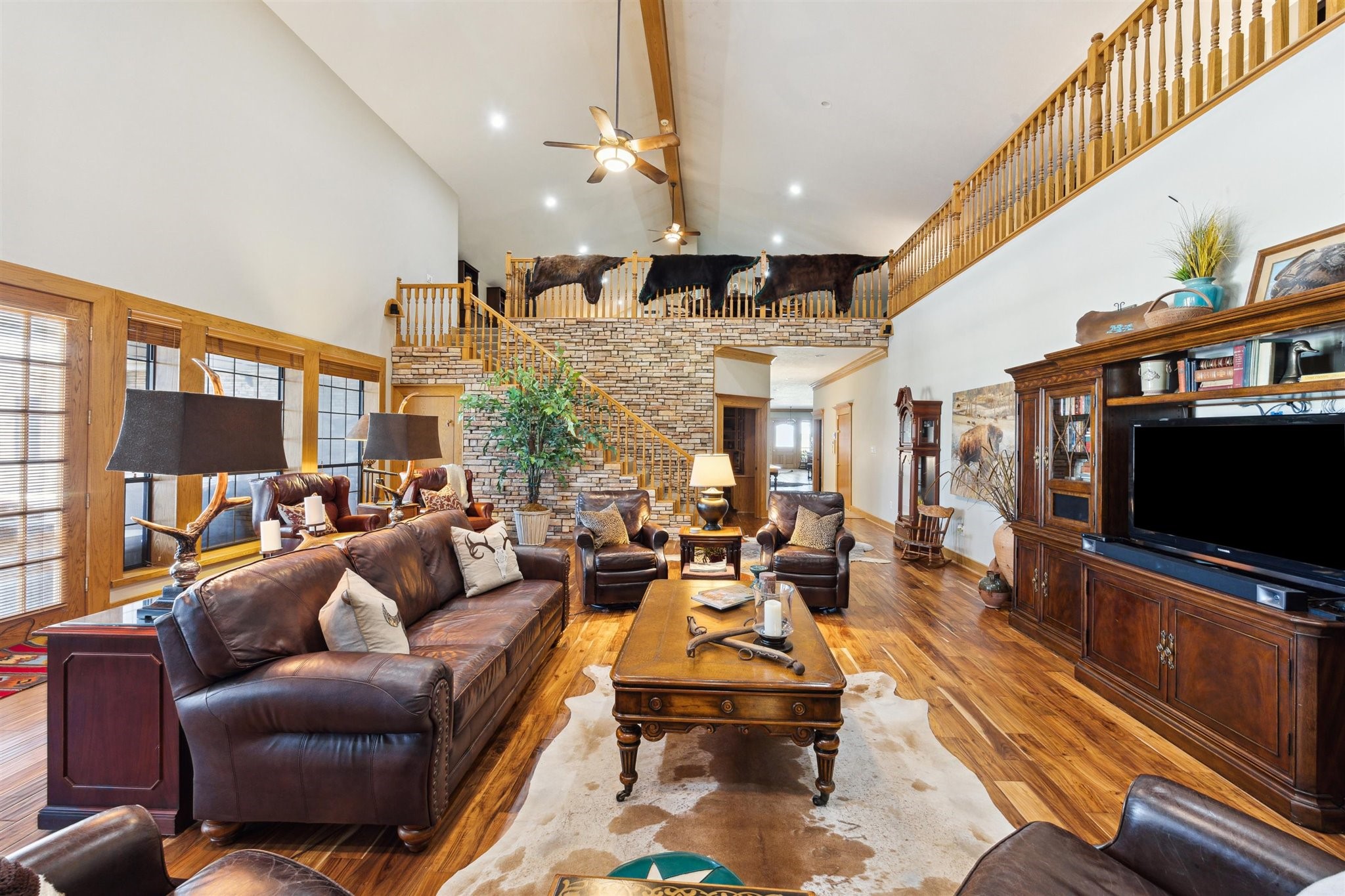 1224 Haines Road Sheridan, TX 77475 - Photo 22 of 49 a living room with furniture and a flat screen tv