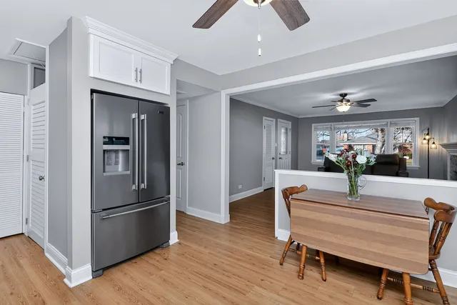 a view of kitchen with furniture and wooden floor