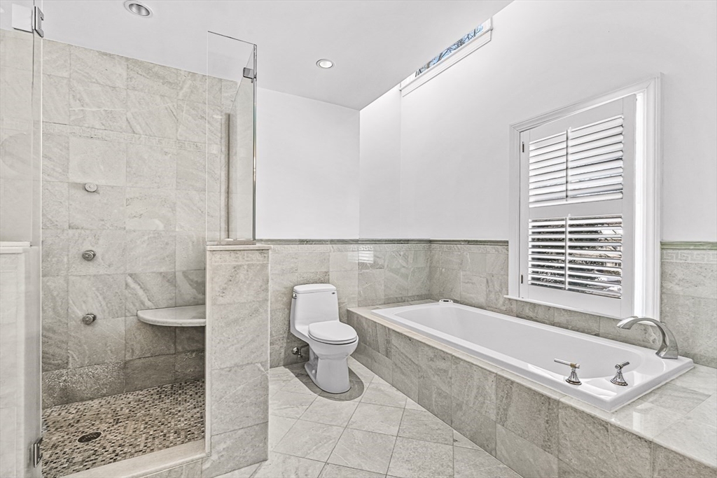 56 Lantern Lane Needham, MA 02492 - Photo 24 of 42 a bathroom with a toilet and a shower