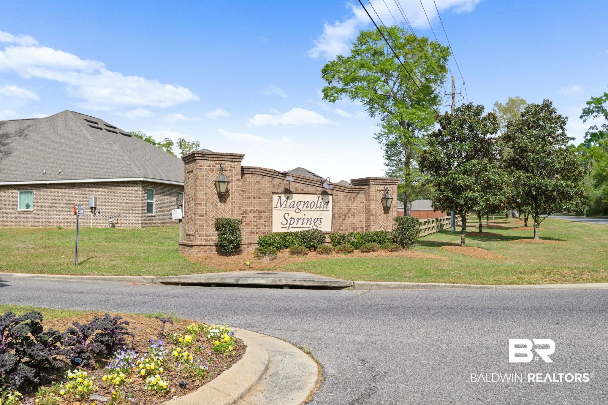2183 Meadowview Loop Semmes, AL 36575 - Photo 52 of 58 Community / neighborhood sign with a lawn