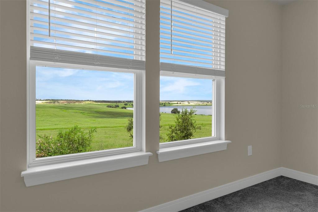 7367 Catania Loop Clermont, FL 34714 - Photo 32 of 58 a view of a room that has a window