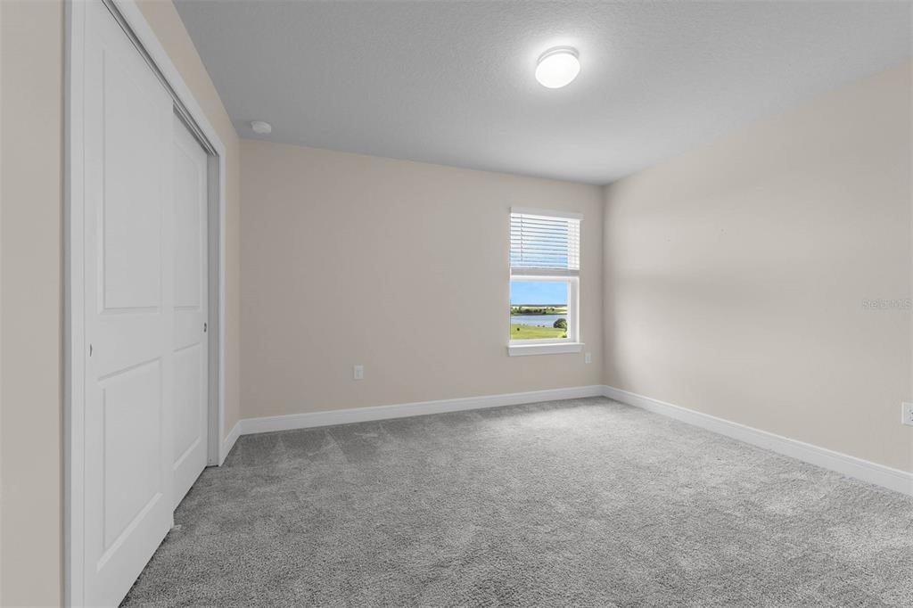 7367 Catania Loop Clermont, FL 34714 - Photo 40 of 58 an empty room with windows