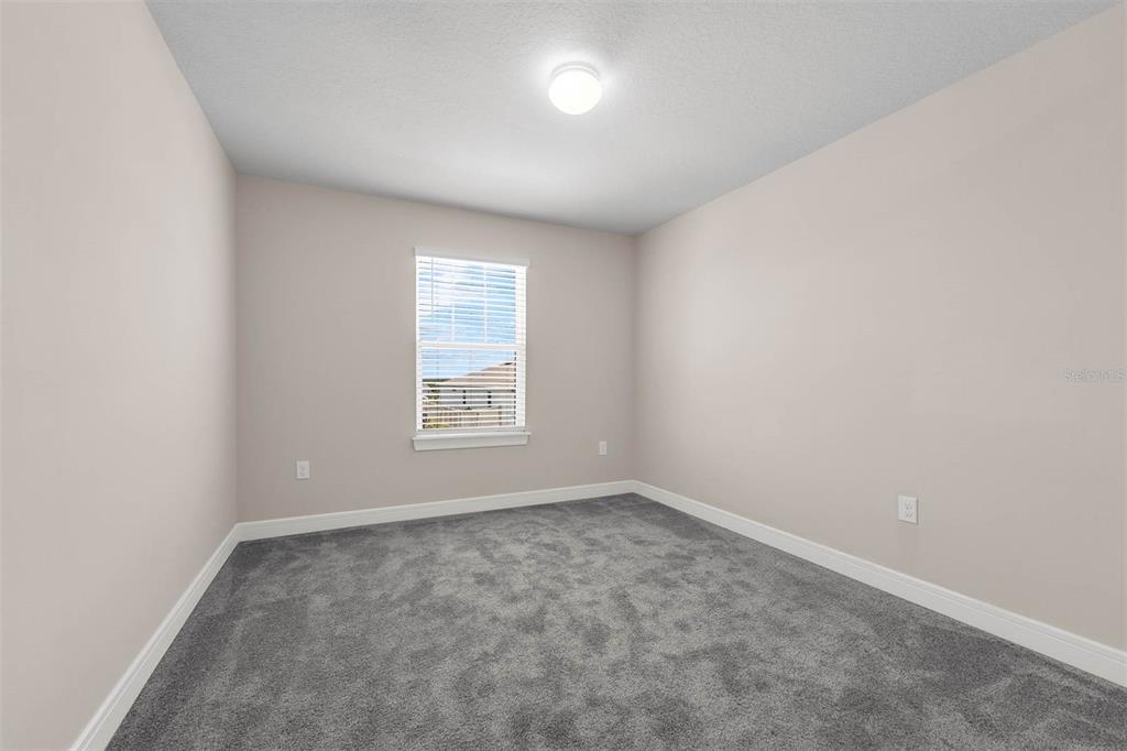 7367 Catania Loop Clermont, FL 34714 - Photo 44 of 58 an empty room with a window