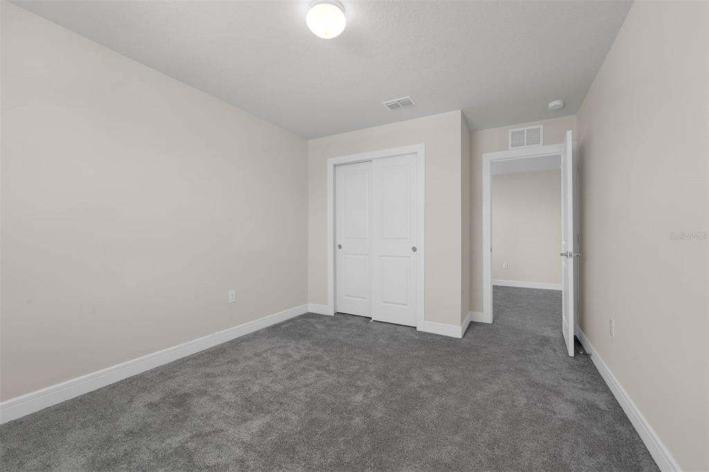 7367 Catania Loop Clermont, FL 34714 - Photo 45 of 58 a view of an empty room