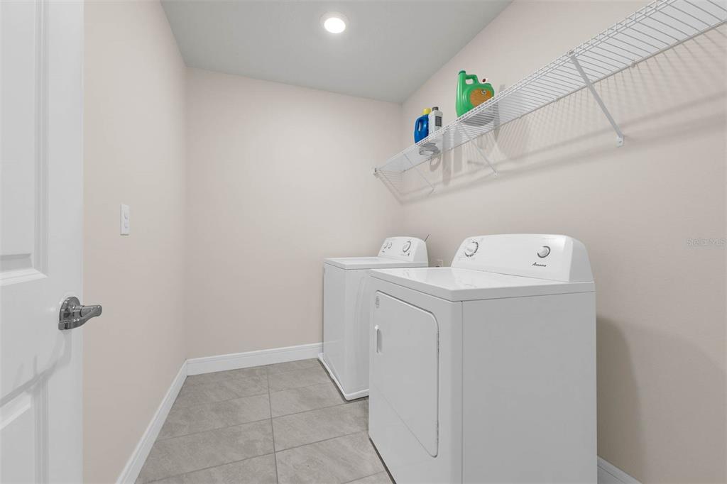 7367 Catania Loop Clermont, FL 34714 - Photo 46 of 58 a utility room with dryer and washer