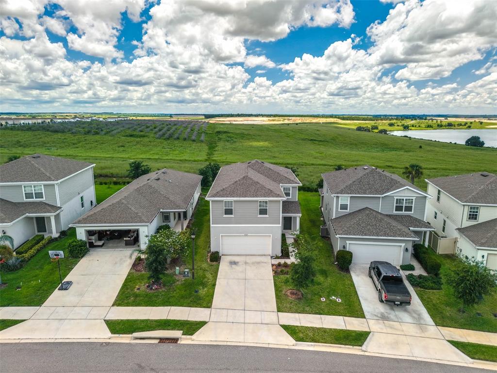 7367 Catania Loop Clermont, FL 34714 - Photo 48 of 58 an aerial view of a house with big yard