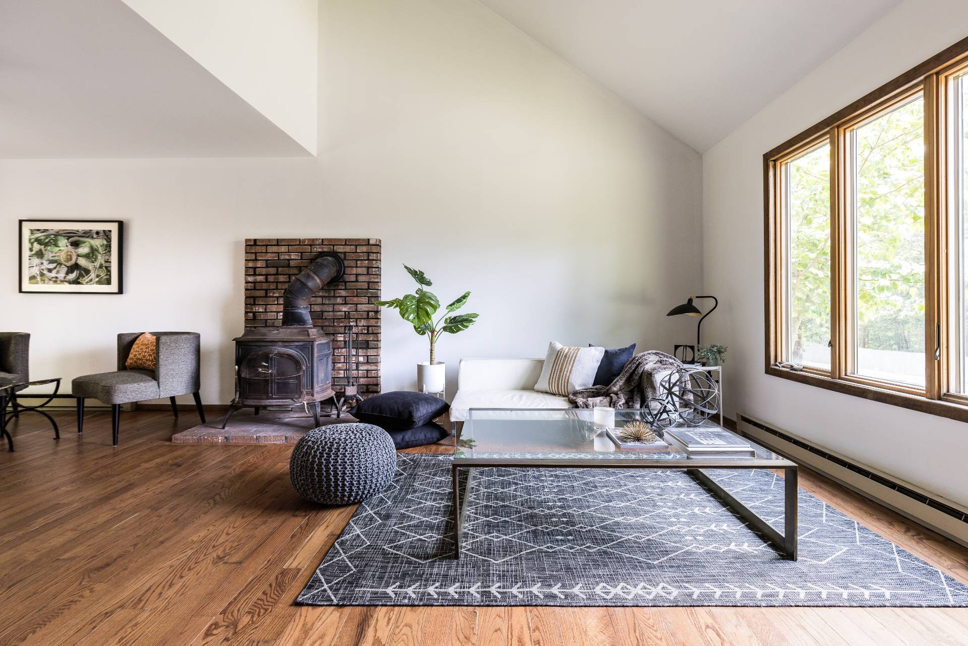 3564 Noyack Road Sag Harbor, NY 11963 - Photo 3 of 10 a living room with furniture rug and a large window