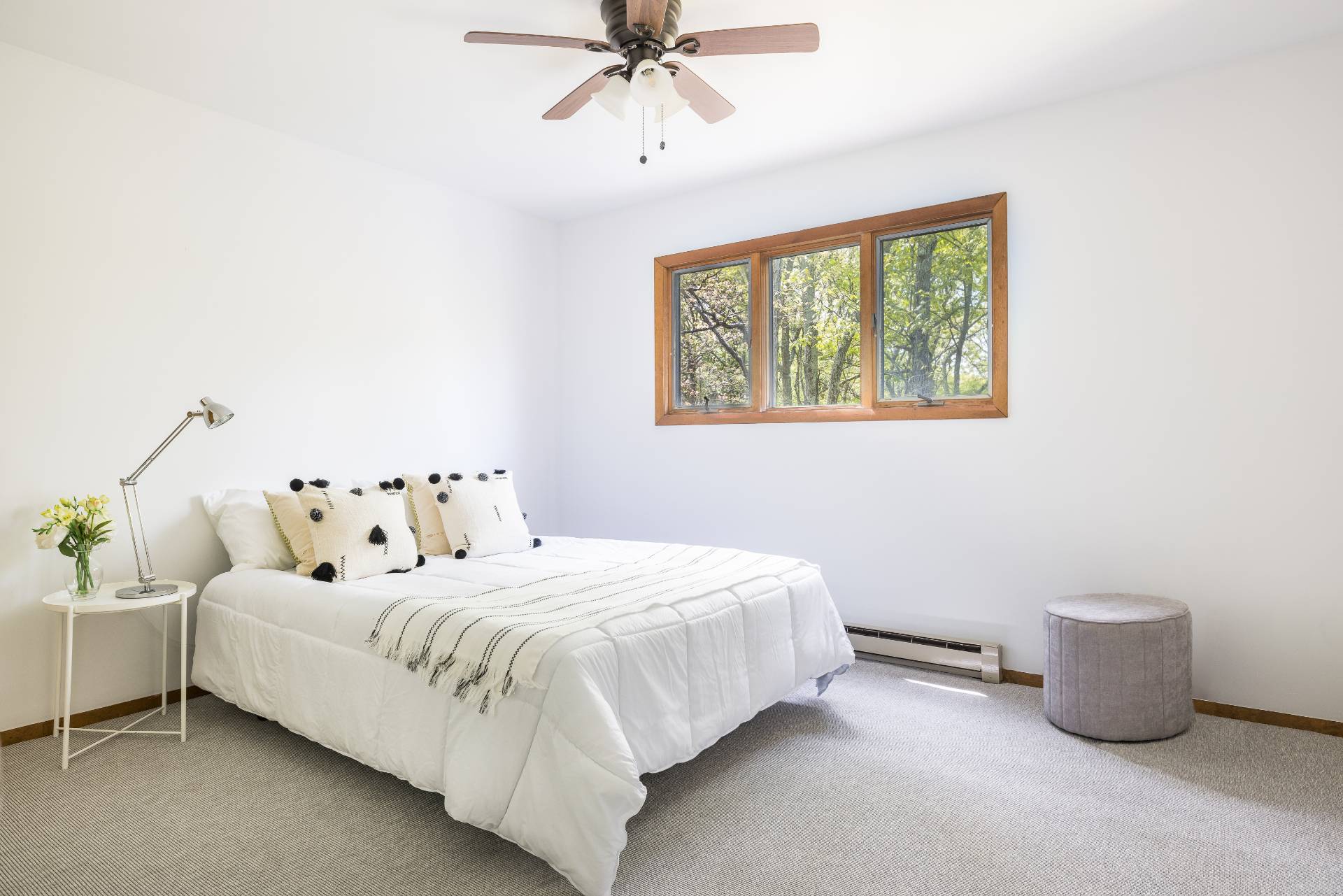 3564 Noyack Road Sag Harbor, NY 11963 - Photo 5 of 10 a bedroom with a bed and a window