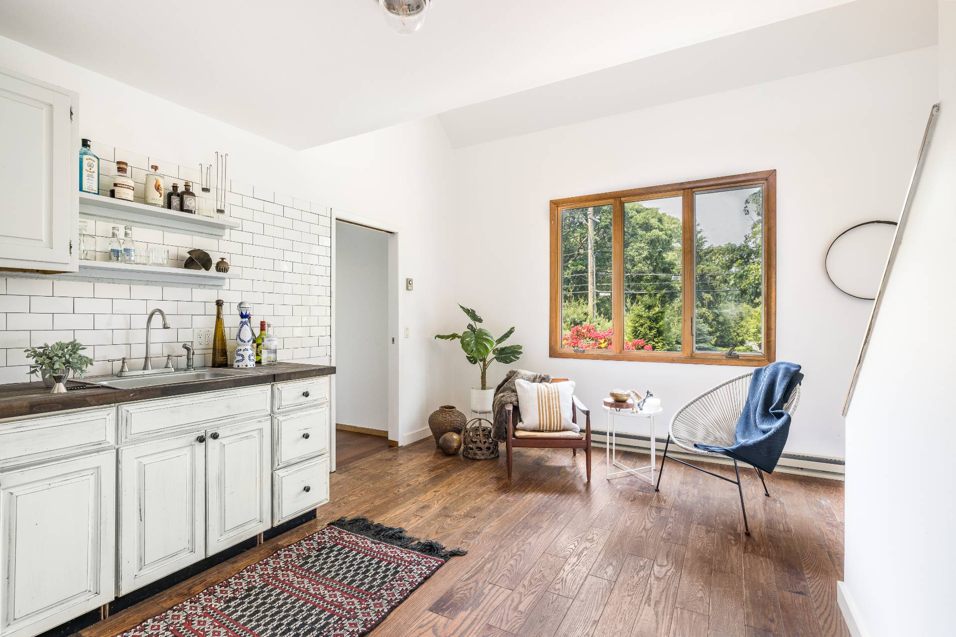 3564 Noyack Road Sag Harbor, NY 11963 - Photo 8 of 10 a living room with furniture and wooden floor