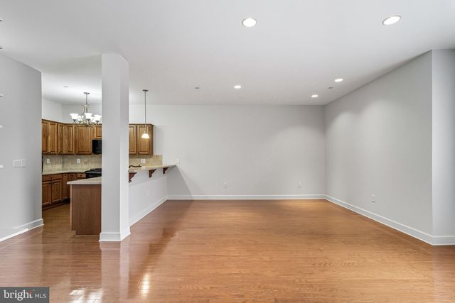 a view of a kitchen with a sink