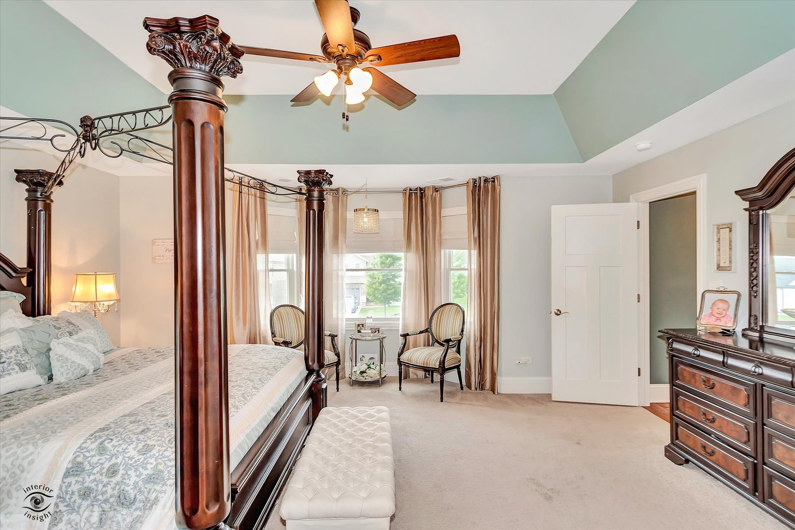 23933 Roberts Street Manhattan, IL 60442 - Photo 11 of 26 a view of a livingroom with furniture and a ceiling fan