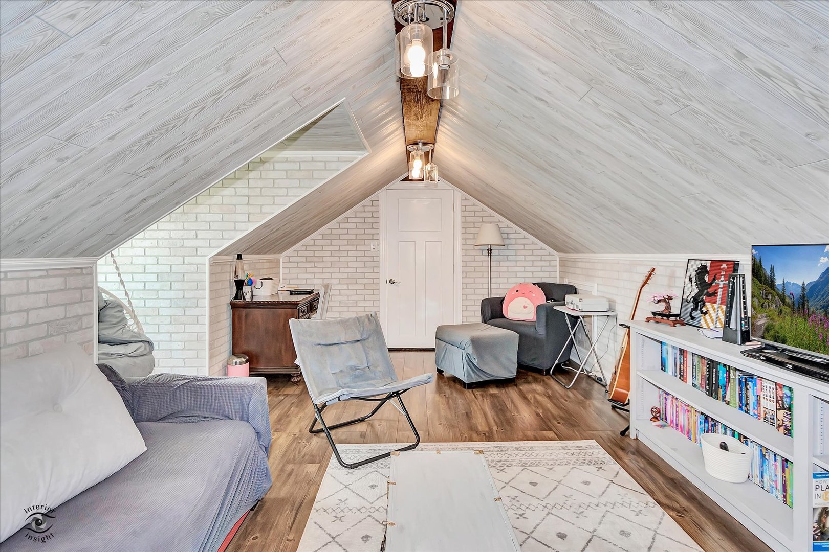 23933 Roberts Street Manhattan, IL 60442 - Photo 14 of 26 a living room with furniture and a book shelf