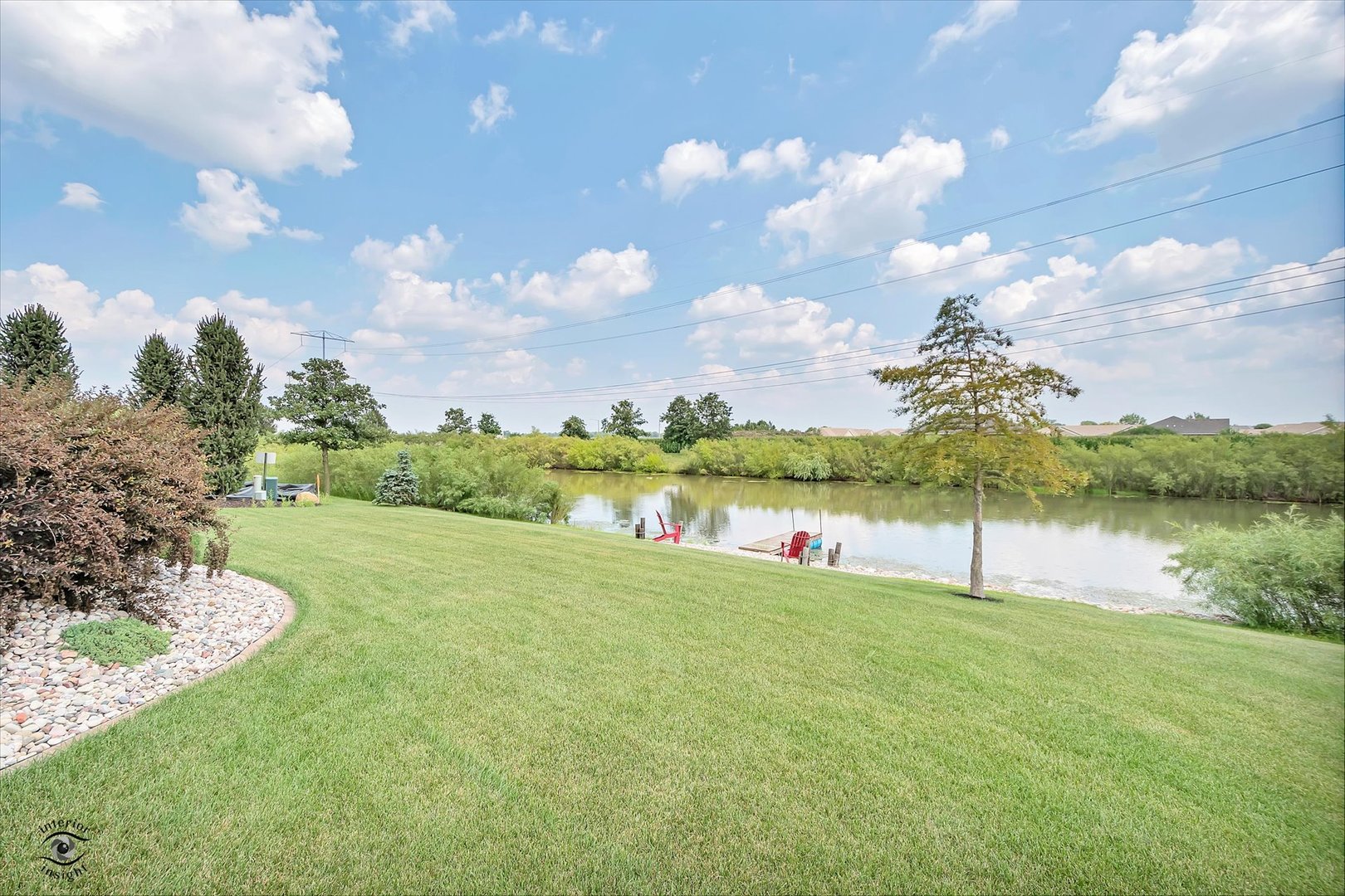23933 Roberts Street Manhattan, IL 60442 - Photo 23 of 26 a view of a lake with a big yard