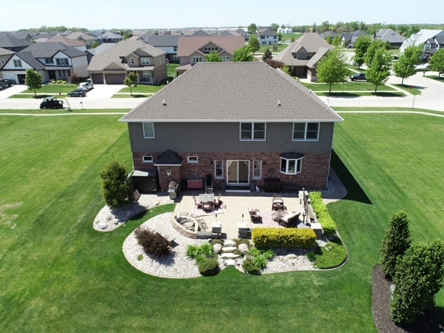 23933 Roberts Street Manhattan, IL 60442 - Photo 24 of 26 a aerial view of a house with garden