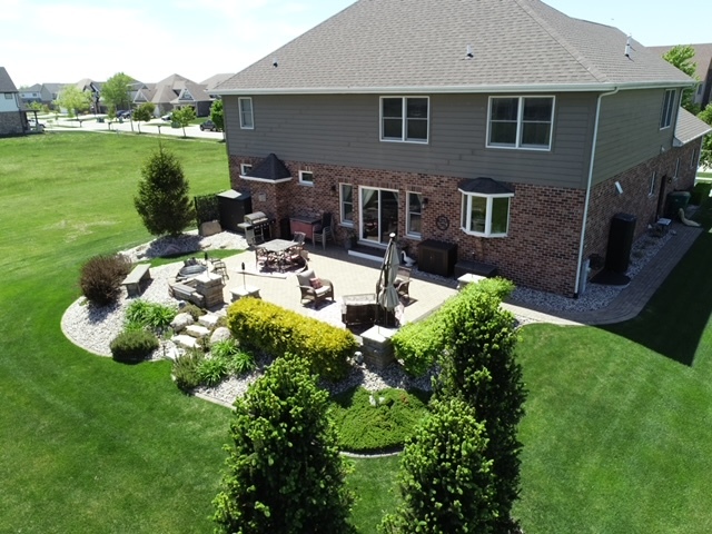 23933 Roberts Street Manhattan, IL 60442 - Photo 26 of 26 a front view of a house with garden