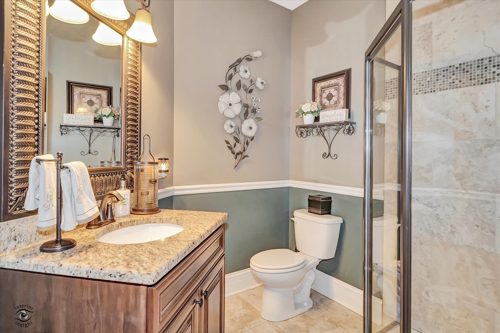 23933 Roberts Street Manhattan, IL 60442 - Photo 8 of 26 a bathroom with a granite countertop sink a toilet and a mirror
