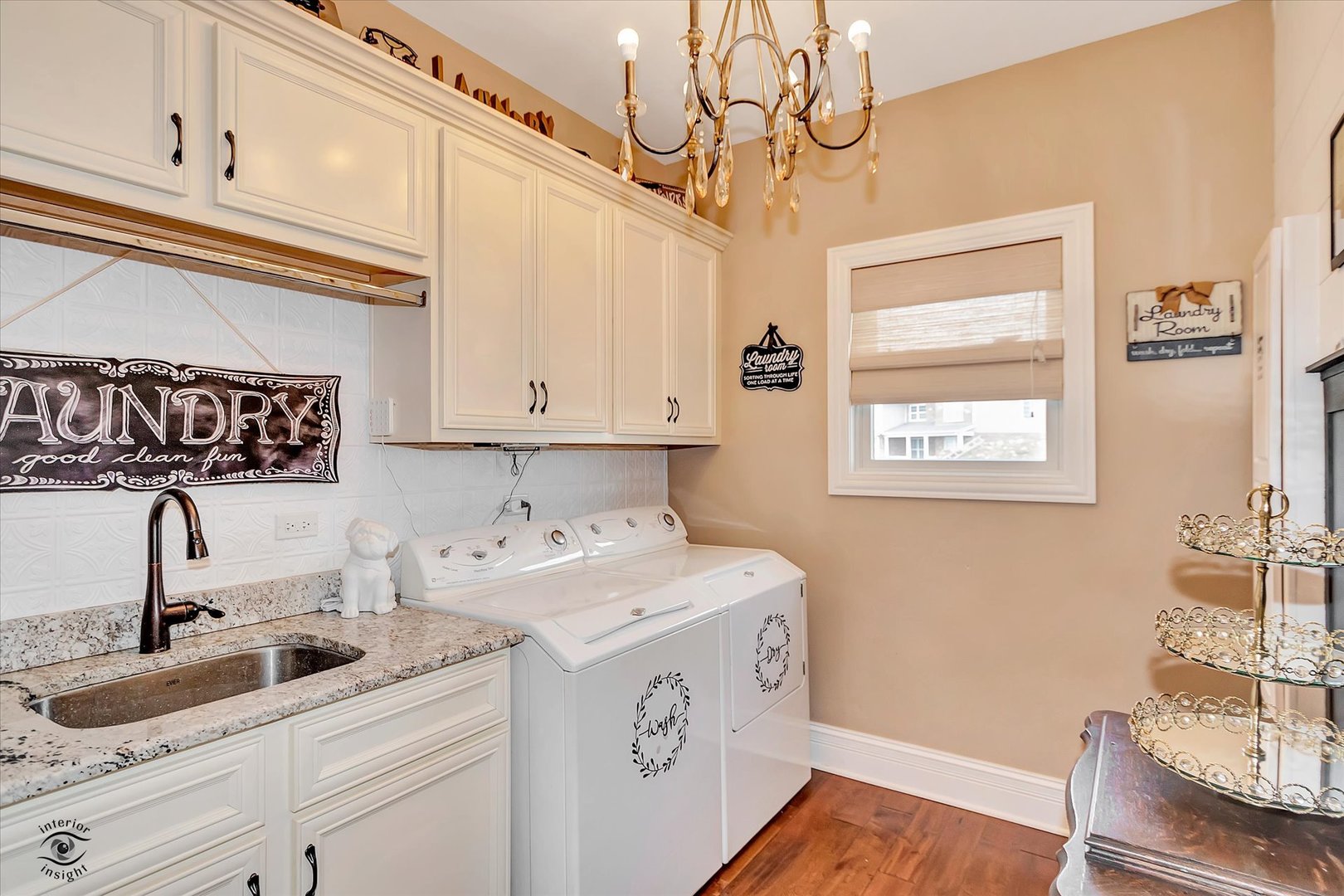 23933 Roberts Street Manhattan, IL 60442 - Photo 9 of 26 a kitchen with a sink cabinets and window