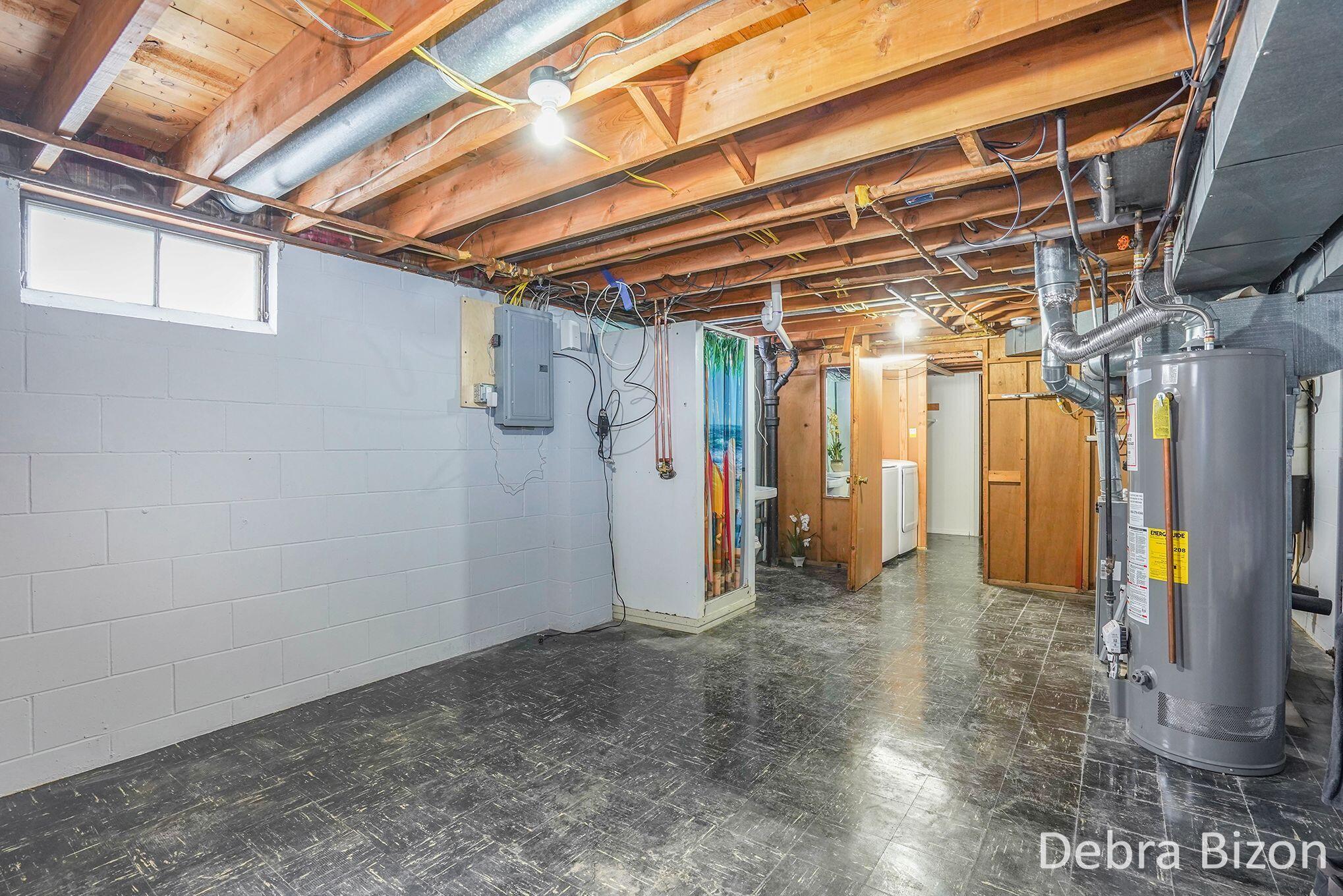 1114 Woodside Road Muskegon, MI 49441 - Photo 19 of 26 1114 Woodside lower storage and bath