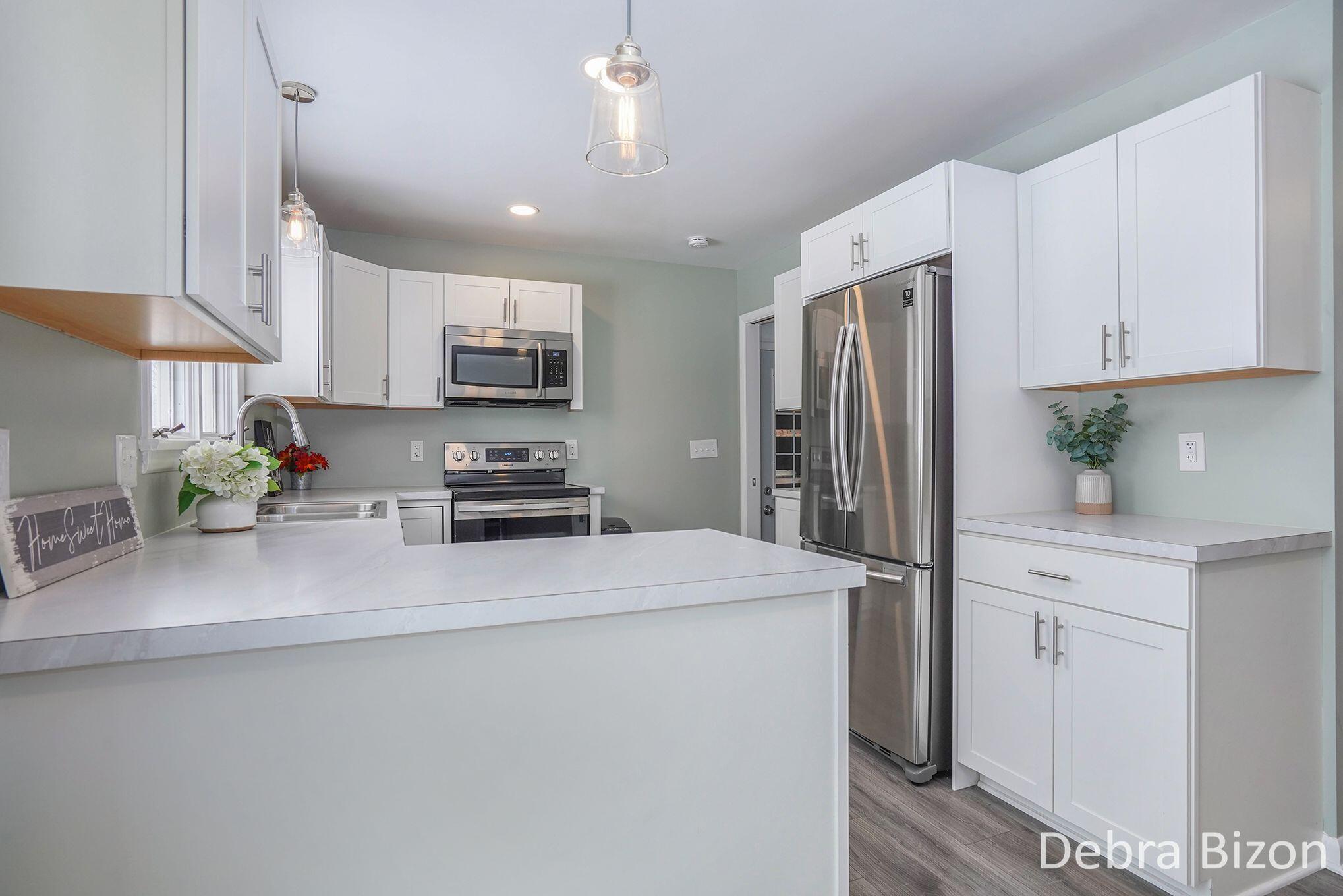 1114 Woodside Road Muskegon, MI 49441 - Photo 6 of 26 1114 Woodside kitchen from snack bar