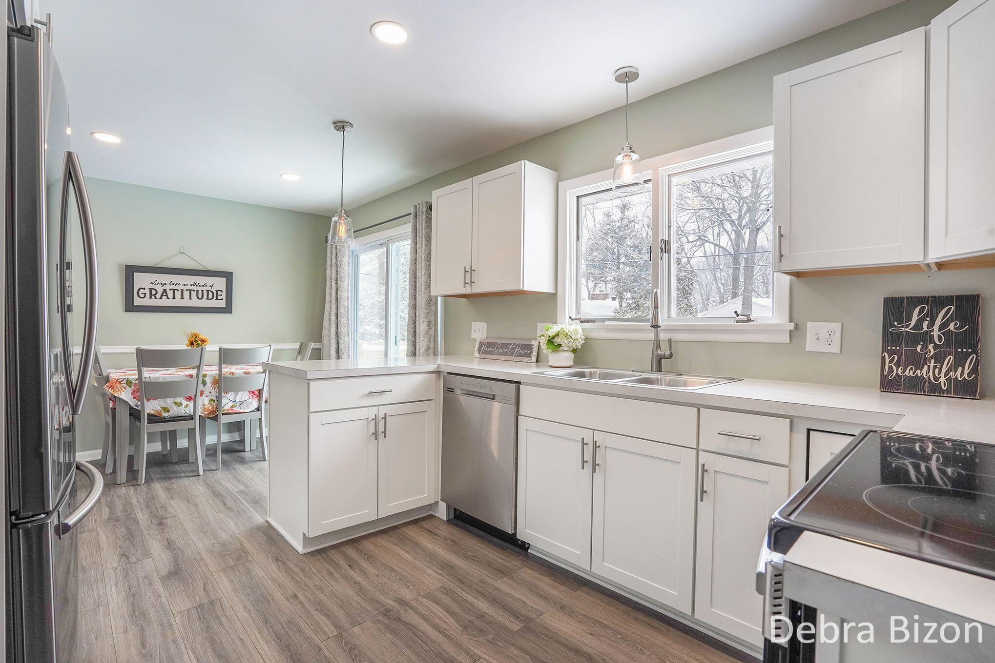 1114 Woodside Road Muskegon, MI 49441 - Photo 8 of 26 1114 Woodside view from kitchen to dinin