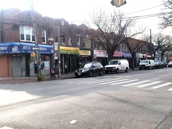 a view of a street in front of a building