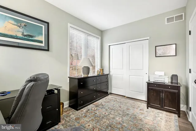 a room with a couch and a stove