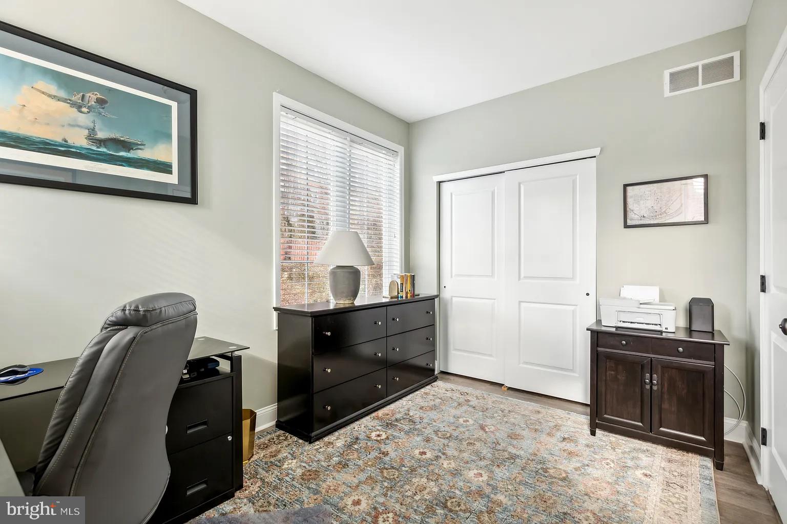 103 Front Street Conshohocken, PA 19428 - Photo 13 of 34 a room with a couch and a stove