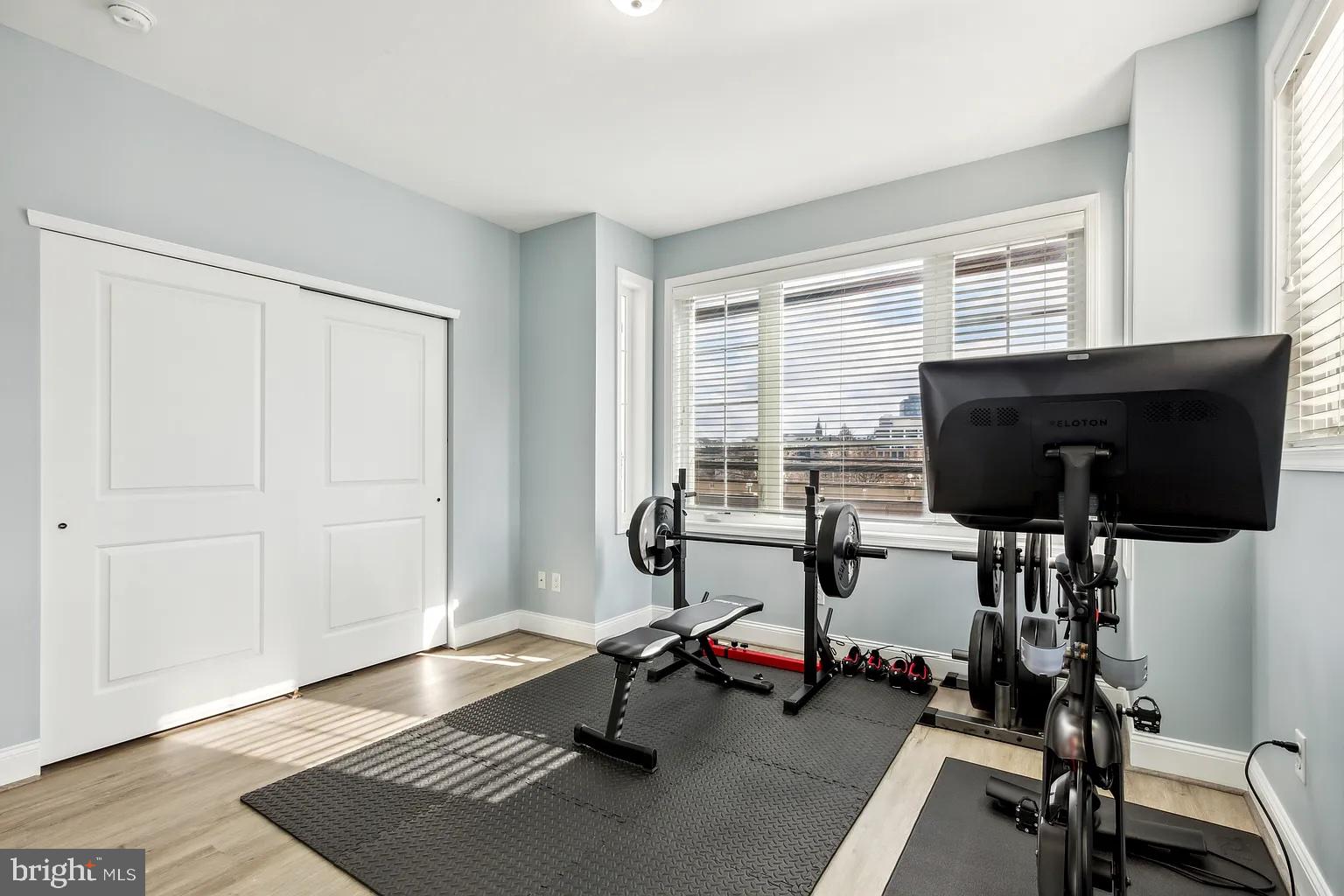 103 Front Street Conshohocken, PA 19428 - Photo 17 of 34 a living room with furniture and a window