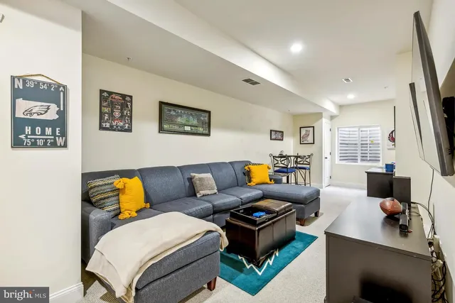 a living room with furniture and a couch