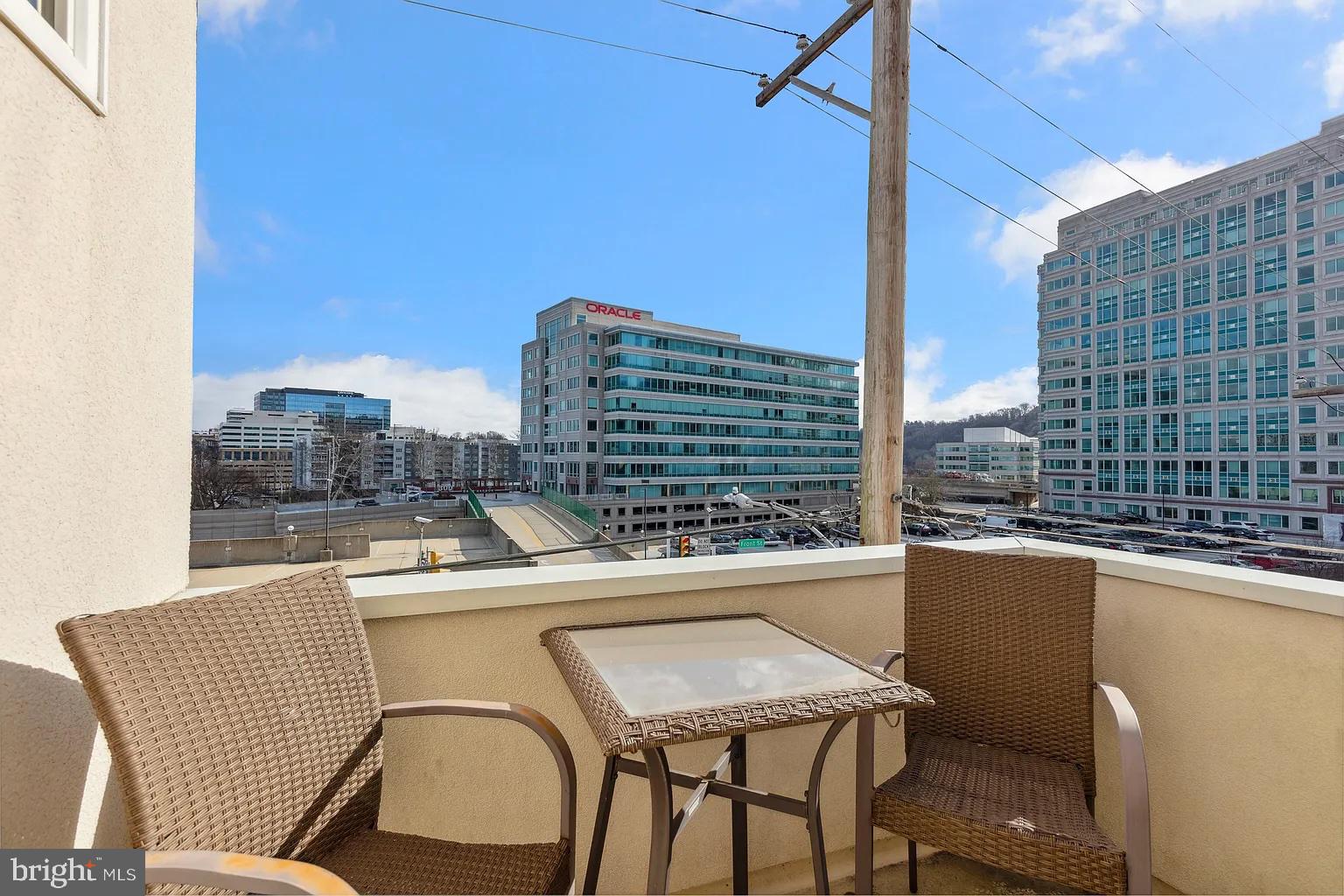 103 Front Street Conshohocken, PA 19428 - Photo 29 of 34 a balcony with a table and chairs
