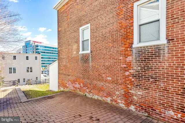 a view of a balcony with a lounge chair