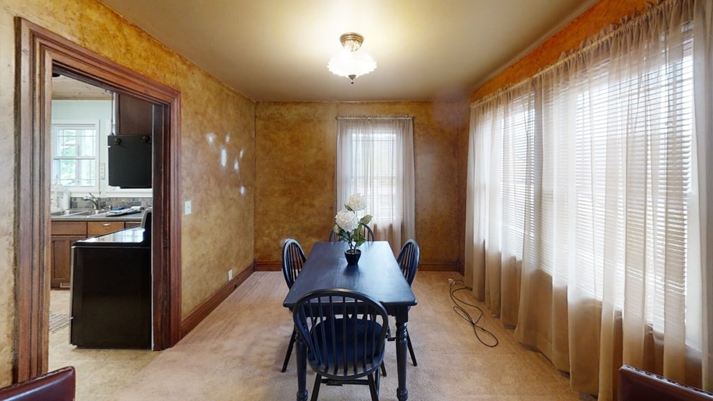 27565 Rhea County Highway Spring City, TN 37381 - Photo 7 of 30 a view of a dining room with furniture and window