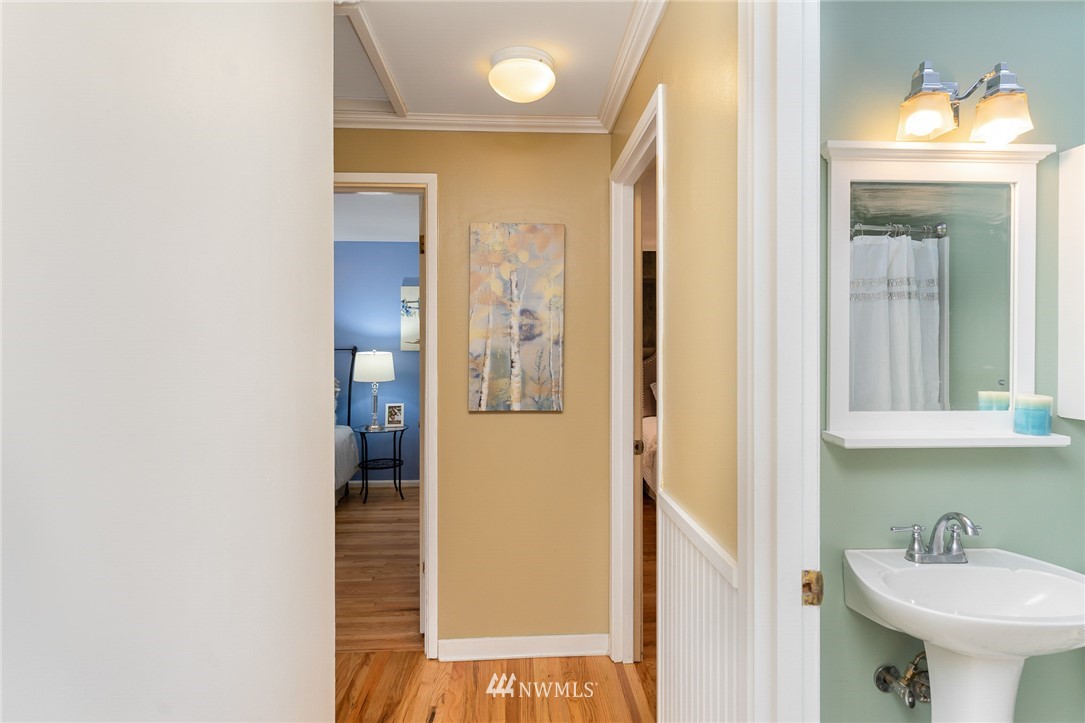 9215 Northeast 183rd Street Bothell, WA 98011 - Photo 16 of 38 a bathroom with a sink and a mirror