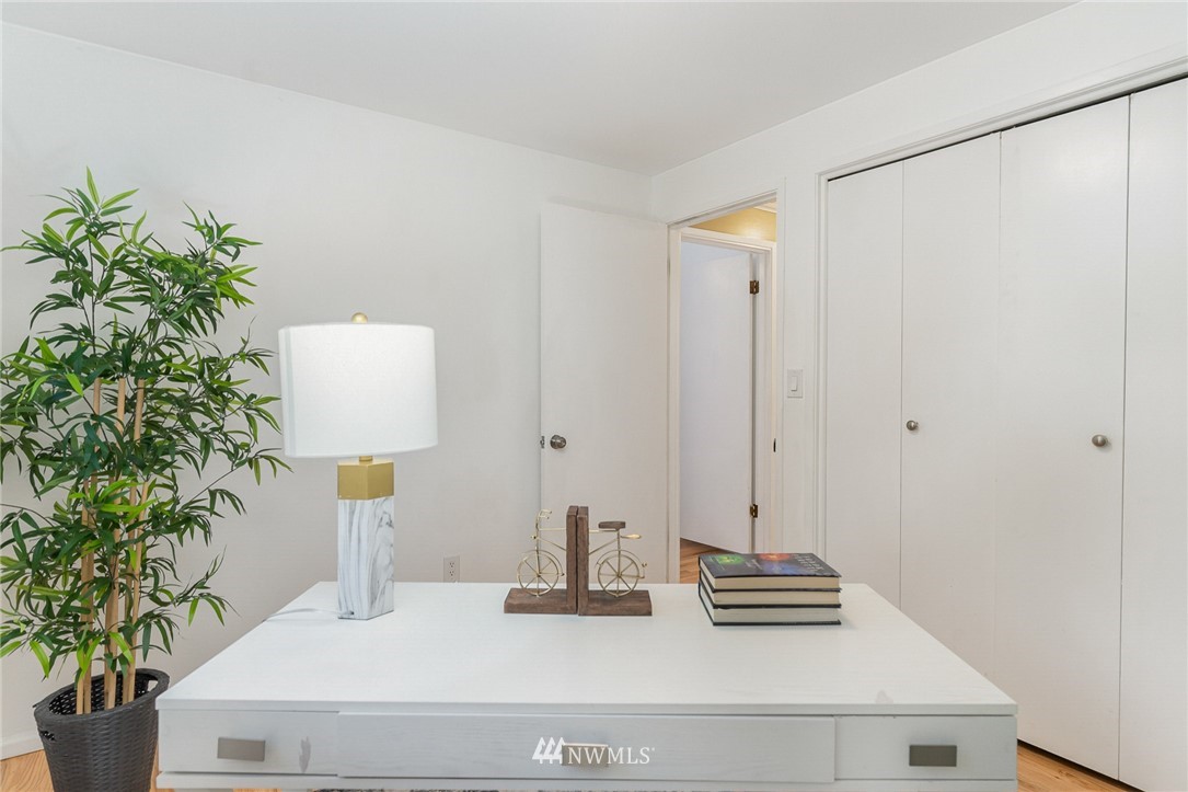 9215 Northeast 183rd Street Bothell, WA 98011 - Photo 20 of 38 a bathroom with a sink and a mirror