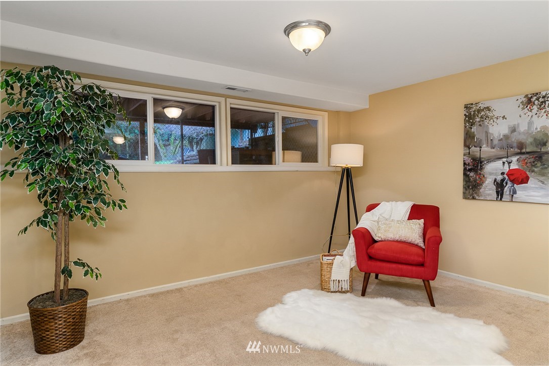9215 Northeast 183rd Street Bothell, WA 98011 - Photo 24 of 38 a living room with furniture