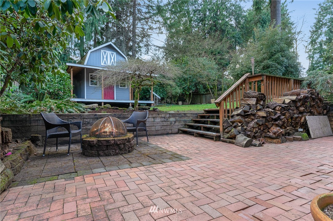 9215 Northeast 183rd Street Bothell, WA 98011 - Photo 36 of 38 a front view of a house with garden