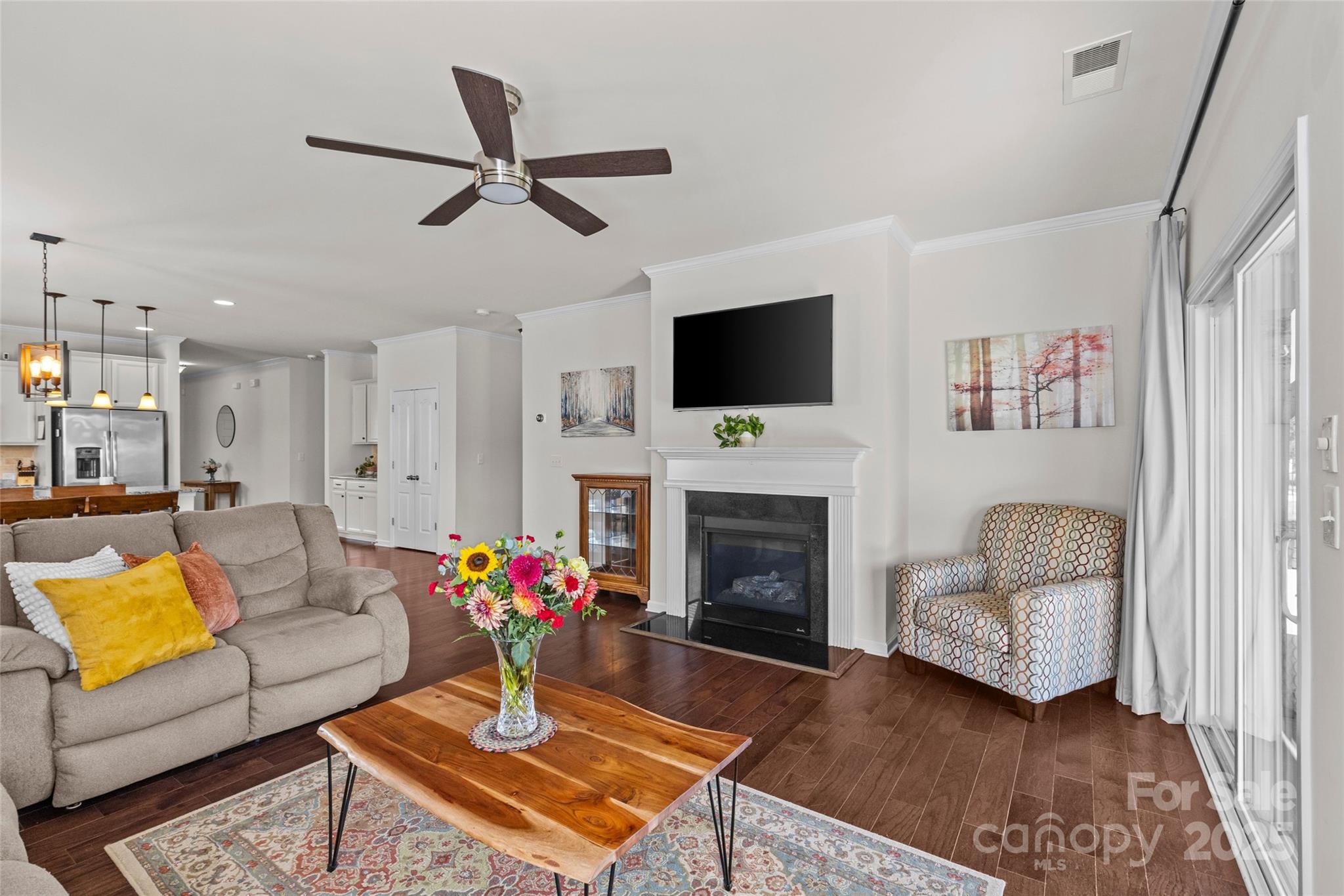 5828 Eleanor Rigby Road Charlotte, NC 28278 - Photo 16 of 39 a living room with furniture fireplace and a flat screen tv