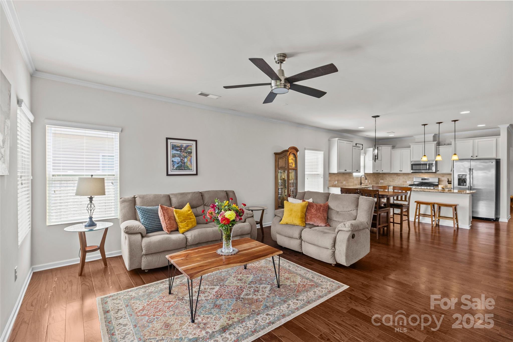 5828 Eleanor Rigby Road Charlotte, NC 28278 - Photo 17 of 39 a living room with furniture and kitchen view